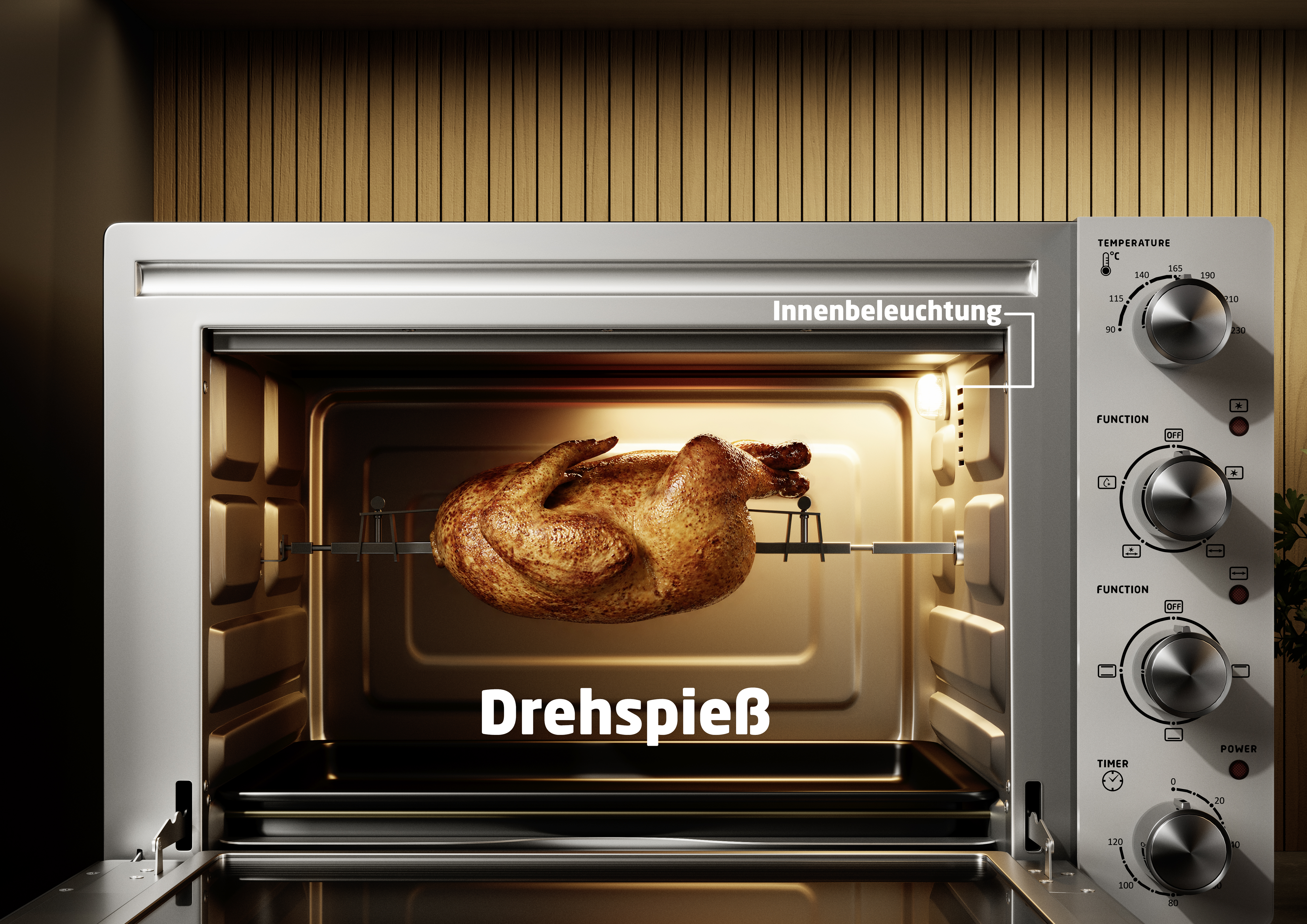 Ein Brathähnchen rotiert auf einem Drehspieß in einem geöffneten Backofen mit Innenbeleuchtung.