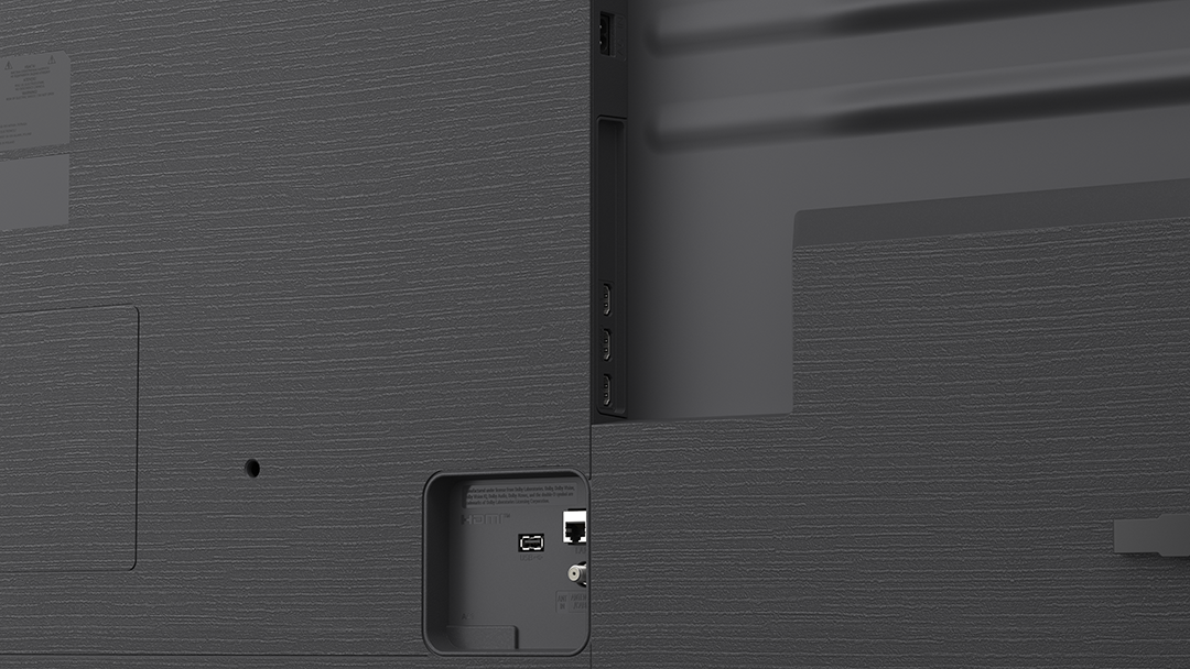 TV hátulja HDMI, USB és Ethernet csatlakozókkal. Texturált felület.