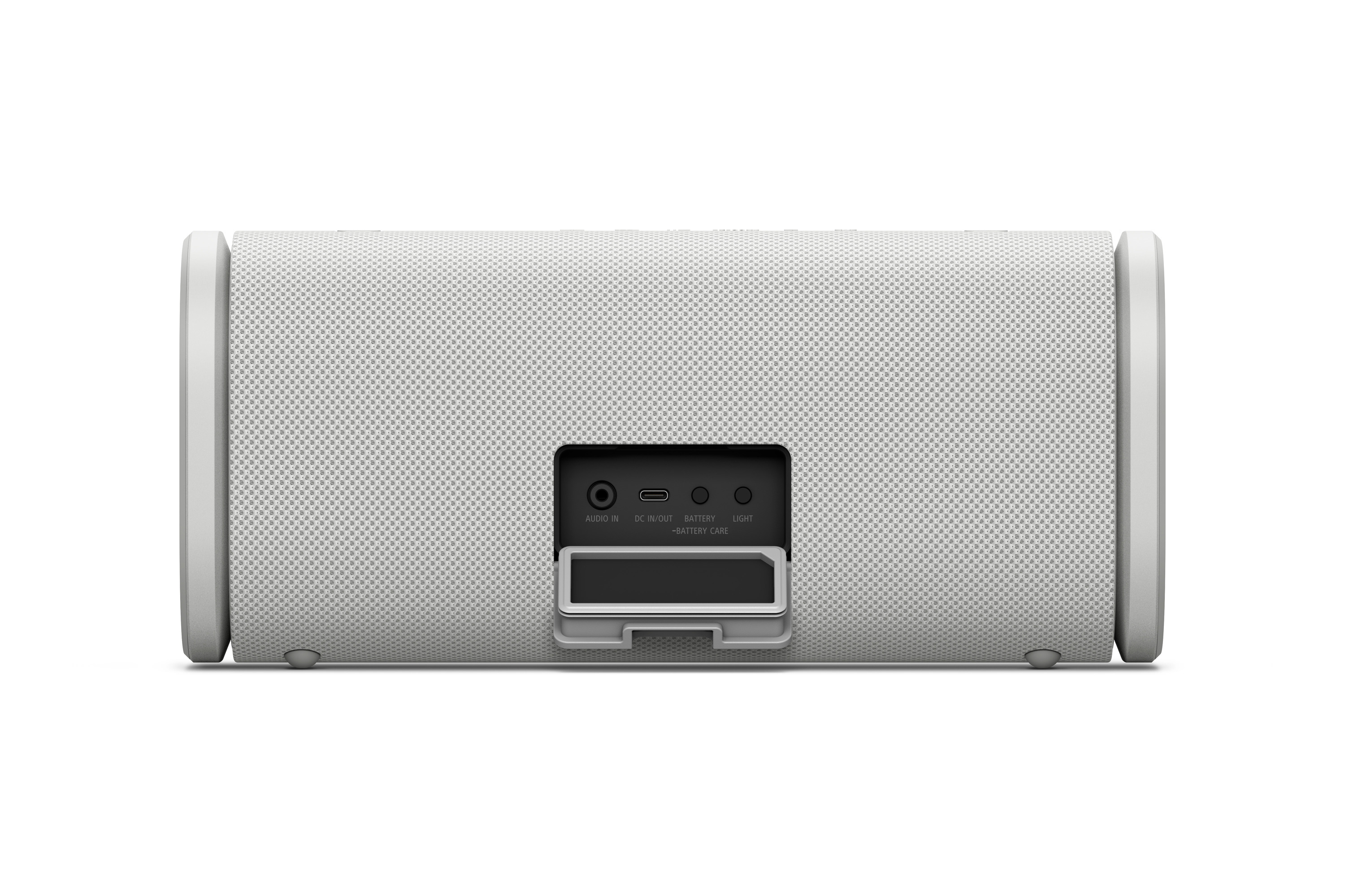 Altoparlante bianco con porte: Audio In, DC In/Out, Batteria e Luce.