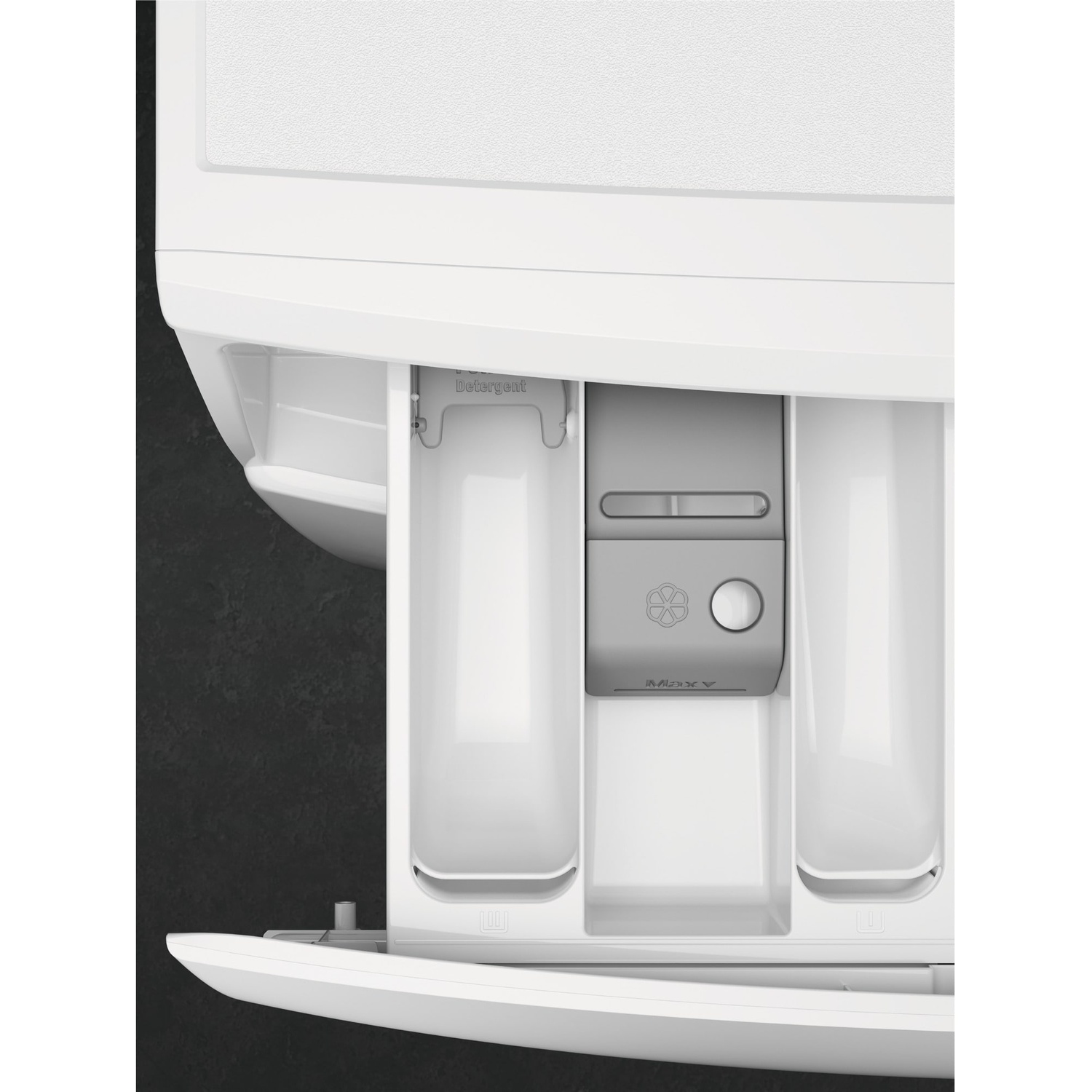 Close-up of a washing machine detergent drawer with three compartments.