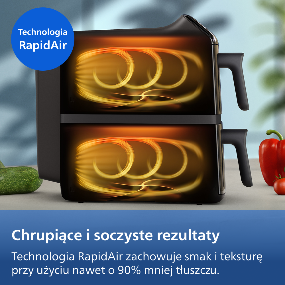 Podwójna frytkownica z cyrkulacją gorącego powietrza i warzywami.