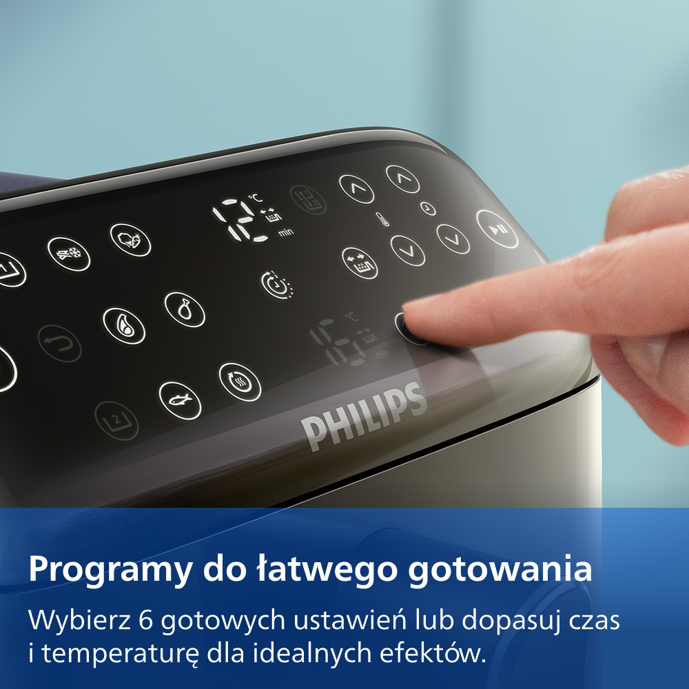 Dłoń naciska cyfrowy panel sterowania urządzenia Philips.