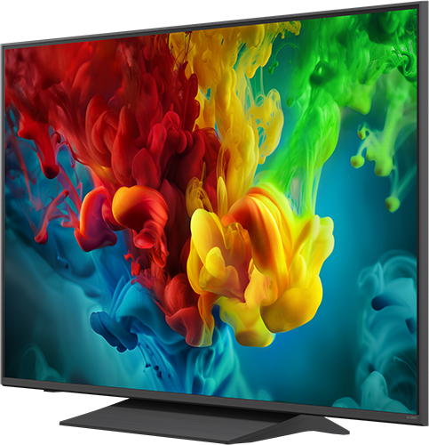 Egy modern TV piros, sárga, zöld és kék színű, színes füstfelhők absztrakt képét jeleníti meg.
