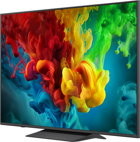 Egy modern TV élénk piros, sárga és zöld színfröccsenéssel.
