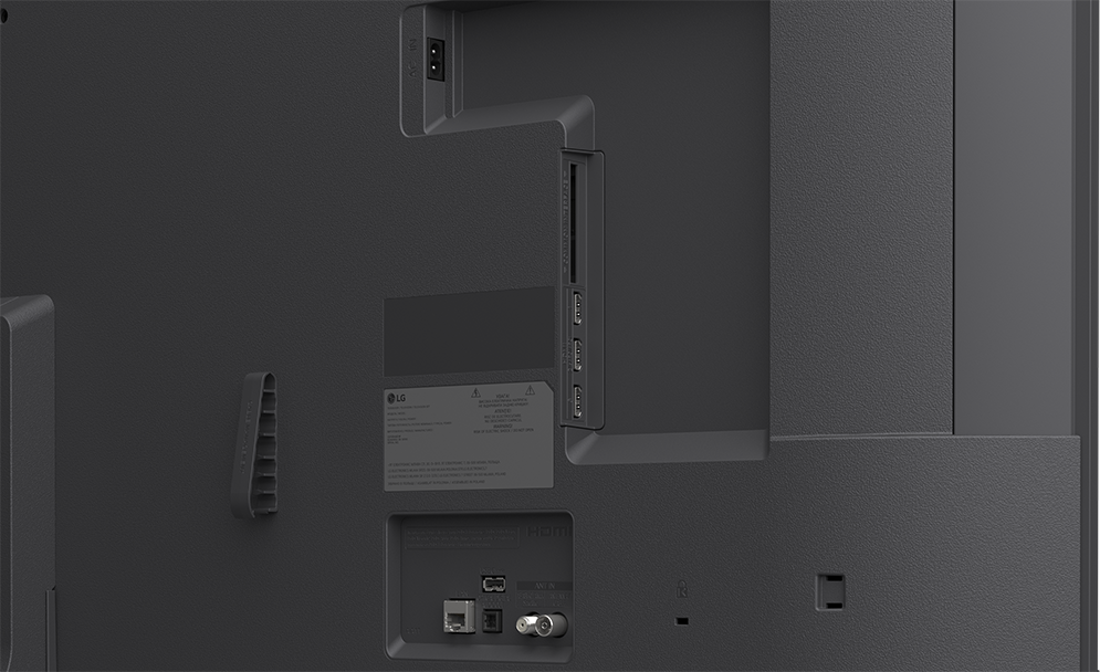 TV hátulja csatlakozókkal: AC táp, HDMI, USB, LAN és antenna bemenetek.