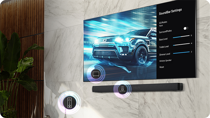 Czarny soundbar pod telewizorem pokazującym samochód. Widoczne są ustawienia.