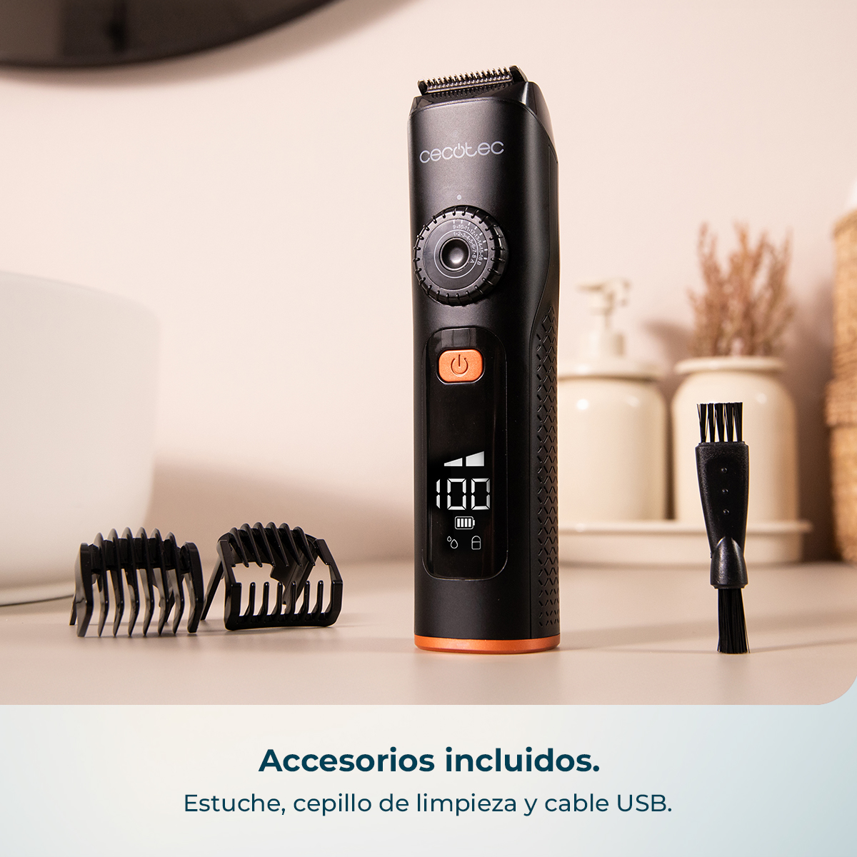 Cortapelos eléctrico negro con detalles naranjas, pantalla digital y accesorios.