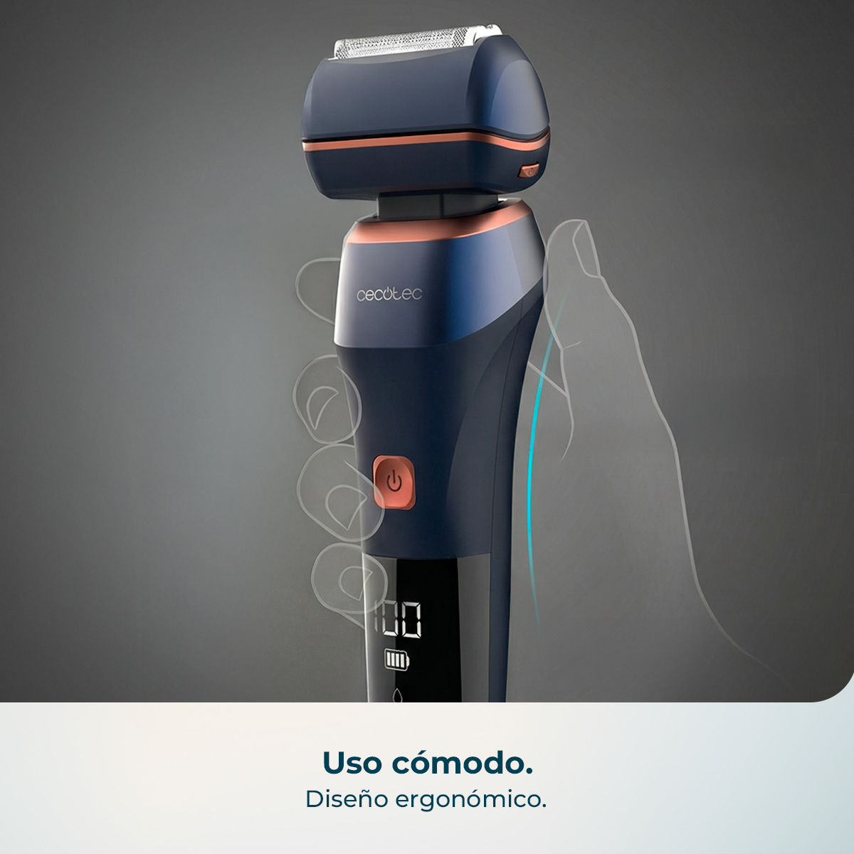 Una afeitadora eléctrica azul oscuro con detalles en cobre, sostenida por un contorno.