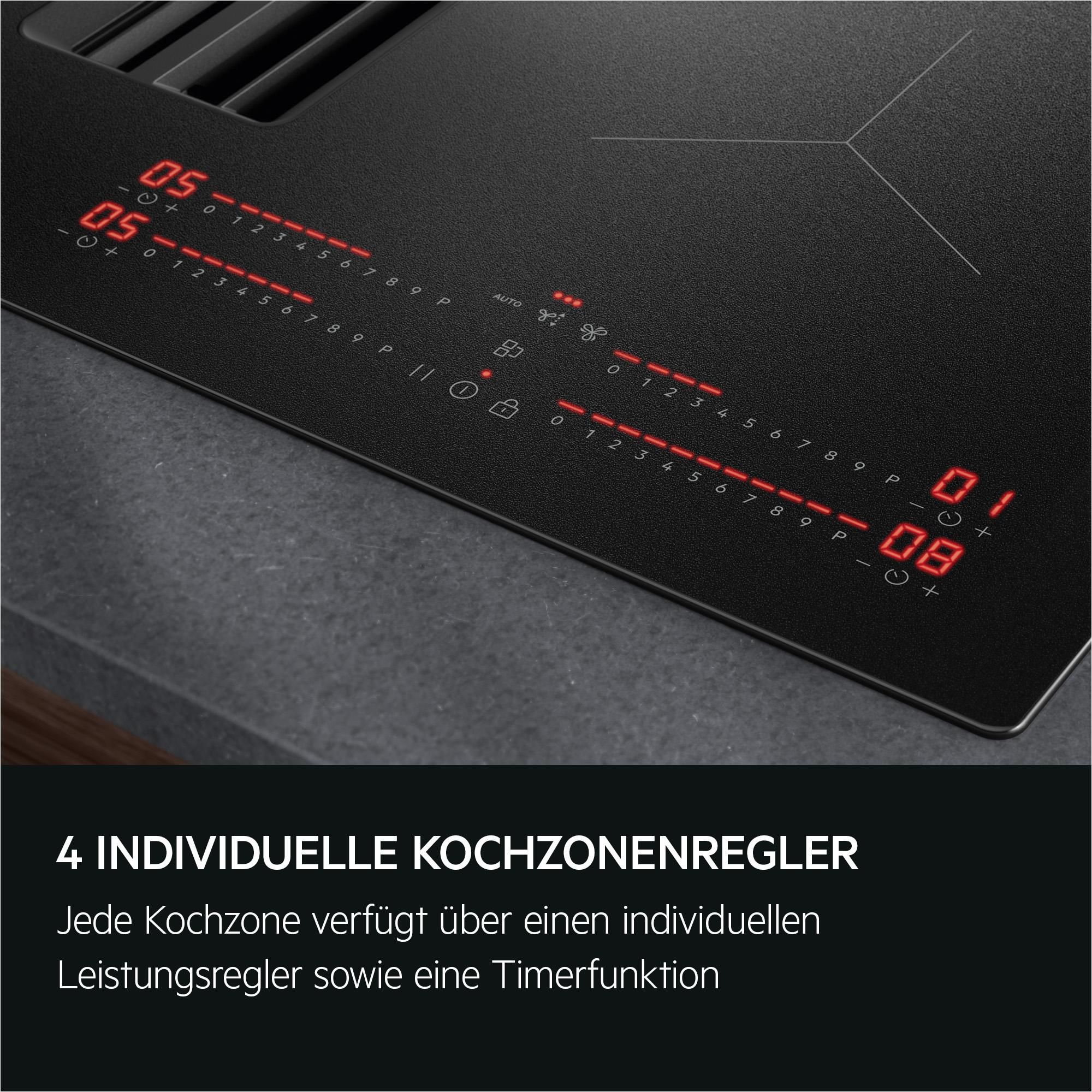 Schwarze Kochplatte mit roter Digitalanzeige für vier Kochzonen.