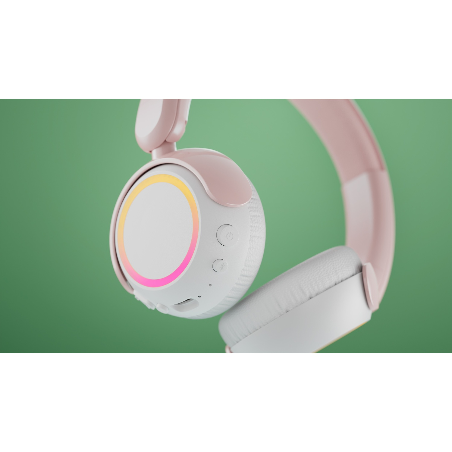 Un paio di cuffie bianche e rosa con illuminazione a LED su sfondo verde.