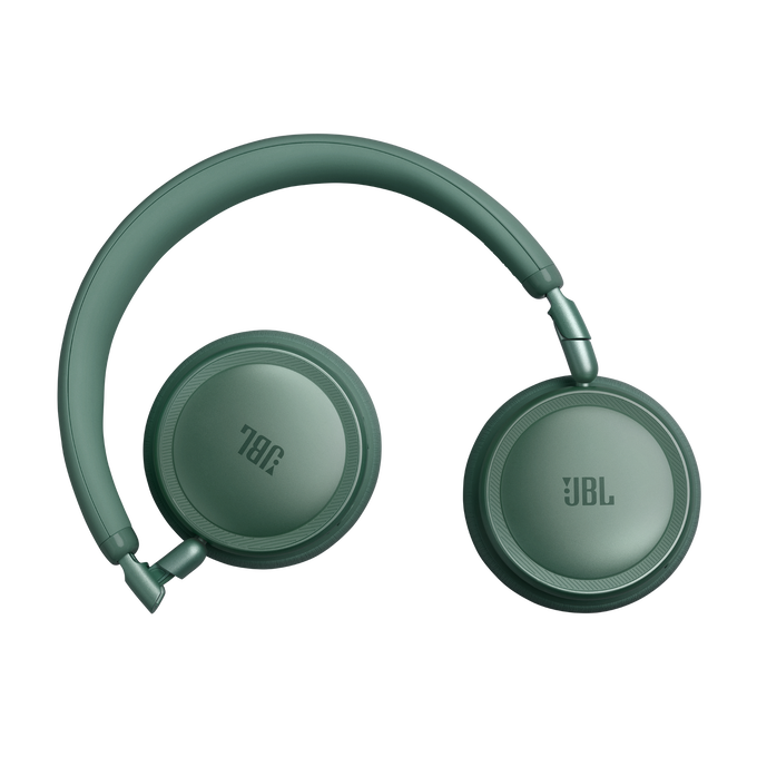 Auriculares JBL verdes con diadema, sobre fondo negro.