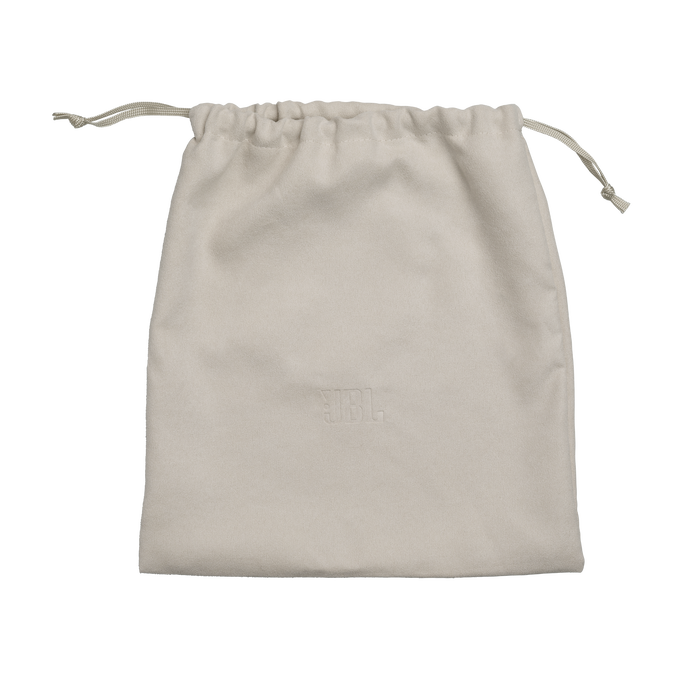 Una bolsa JBL color crema con cordón sobre fondo negro.