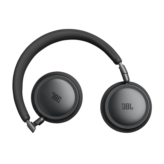 Auriculares JBL negros con detalles plateados sobre fondo negro.