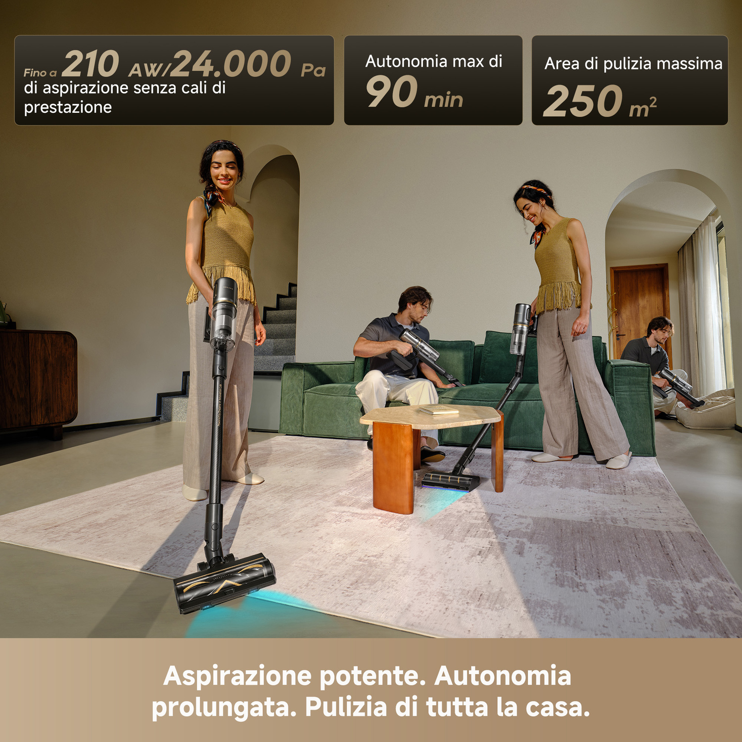 Persone in un soggiorno con aspirapolvere senza fili. Potenza 210 AW.