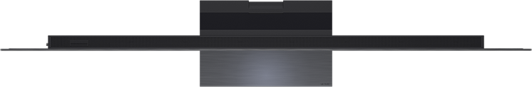 Egy fekete, texturált előlapú soundbar sötét felületen ül egy televízió képernyője alatt.