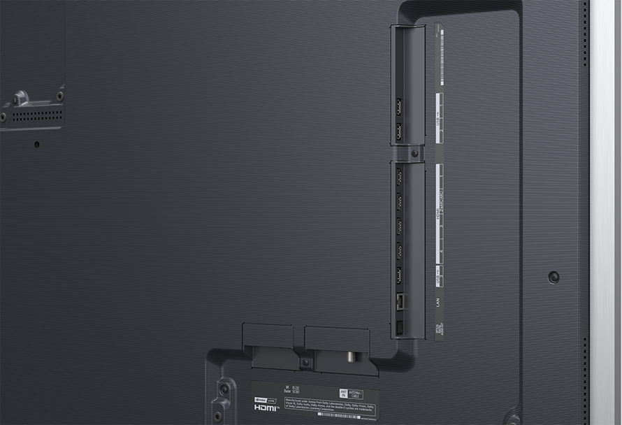 TV hátoldala csatlakozókkal: HDMI, USB, LAN és antenna.