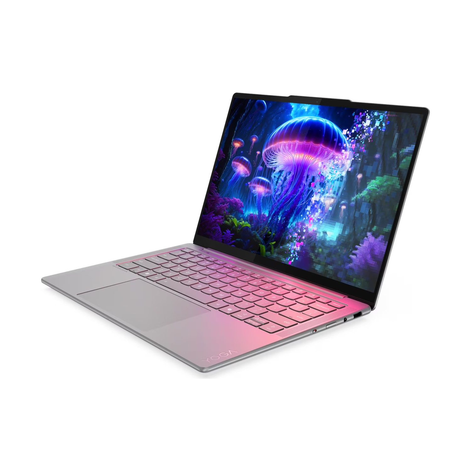 Un laptop argentato con uno sfondo colorato di meduse e piante sottomarine.