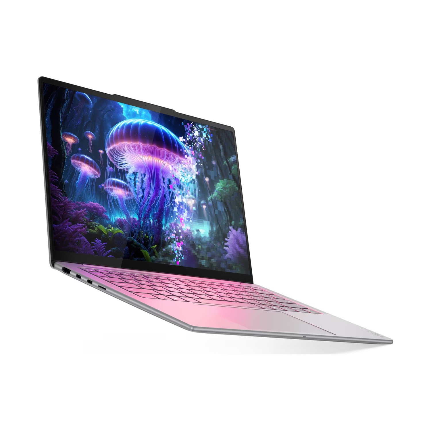 Un laptop rosa mostra una scena sottomarina con meduse sullo schermo.