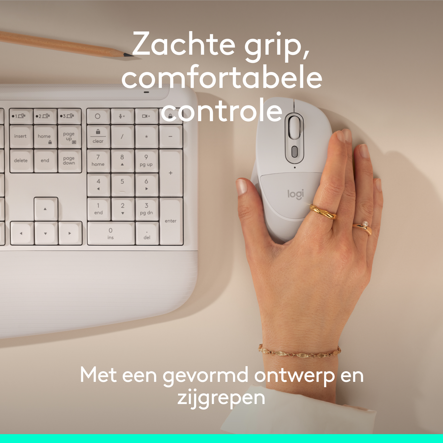 A white mouse held by a hand on a keyboard. Subtle lighting.