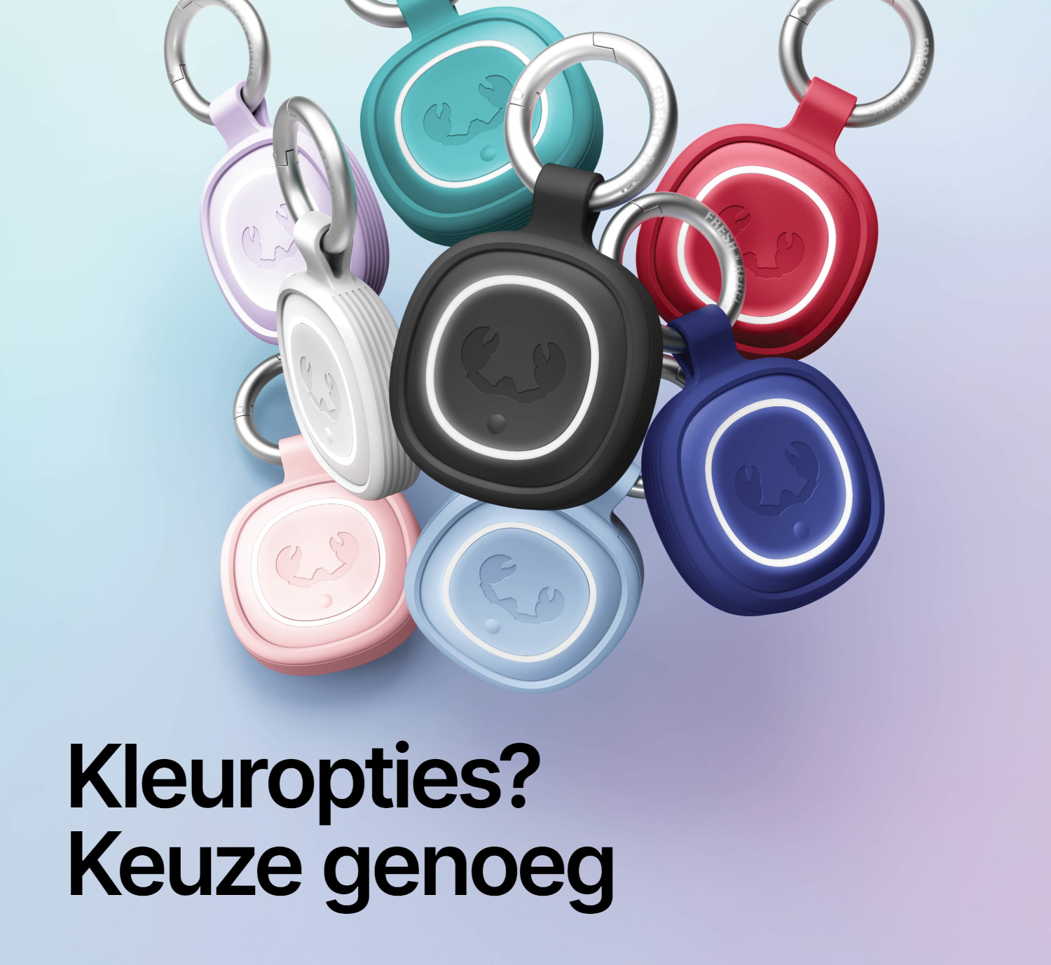 Meerdere kleurrijke sleutelhangers met krablogo op lichte achtergrond.