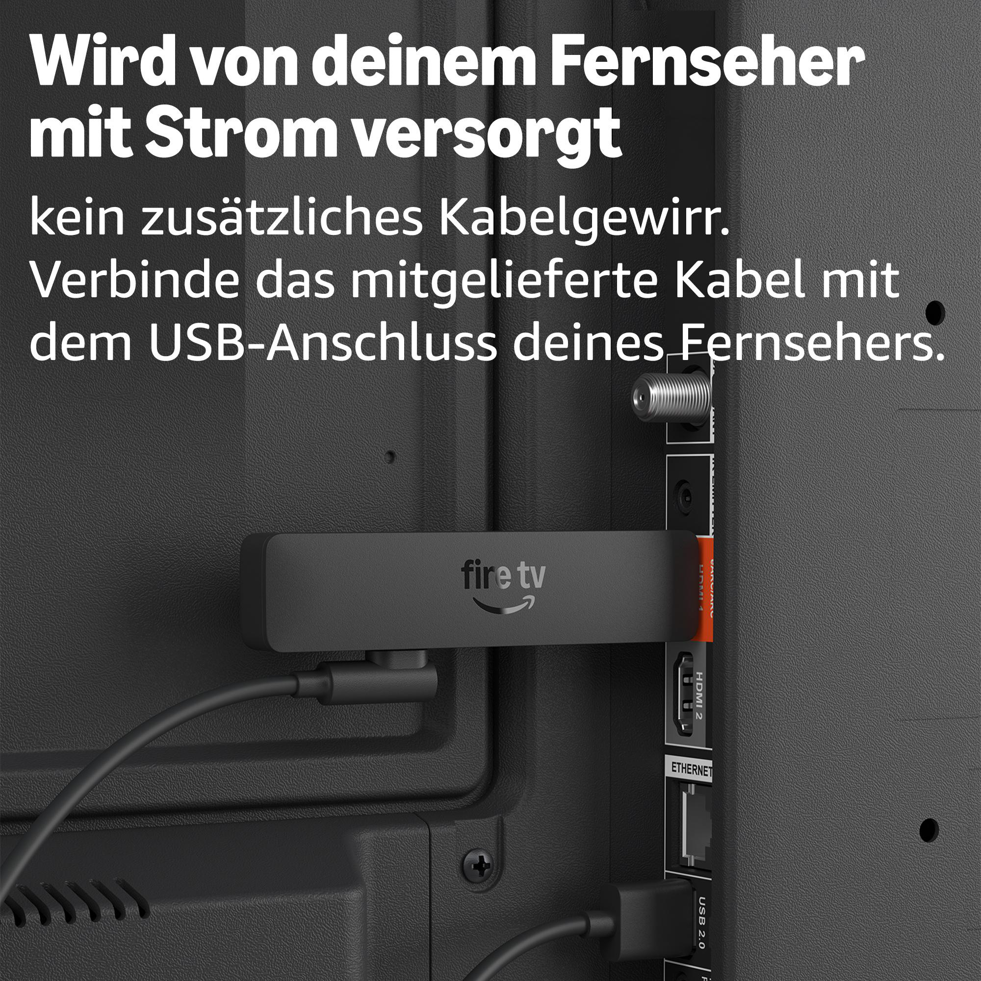 Ein Fire TV-Stick ist an den USB-Anschluss eines Fernsehers angeschlossen.