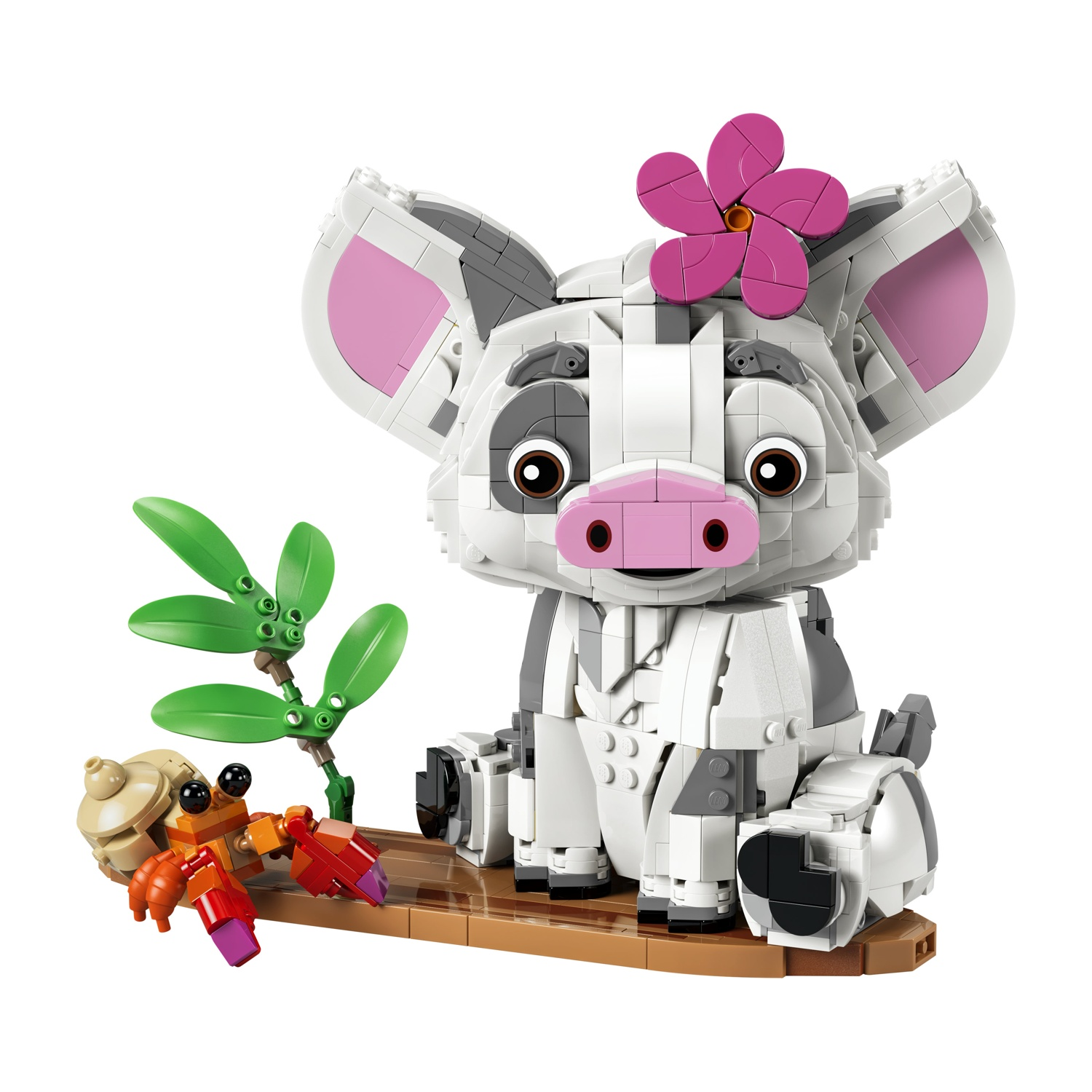 Un Pua Lego di Oceania con granchio e pianta su base marrone.