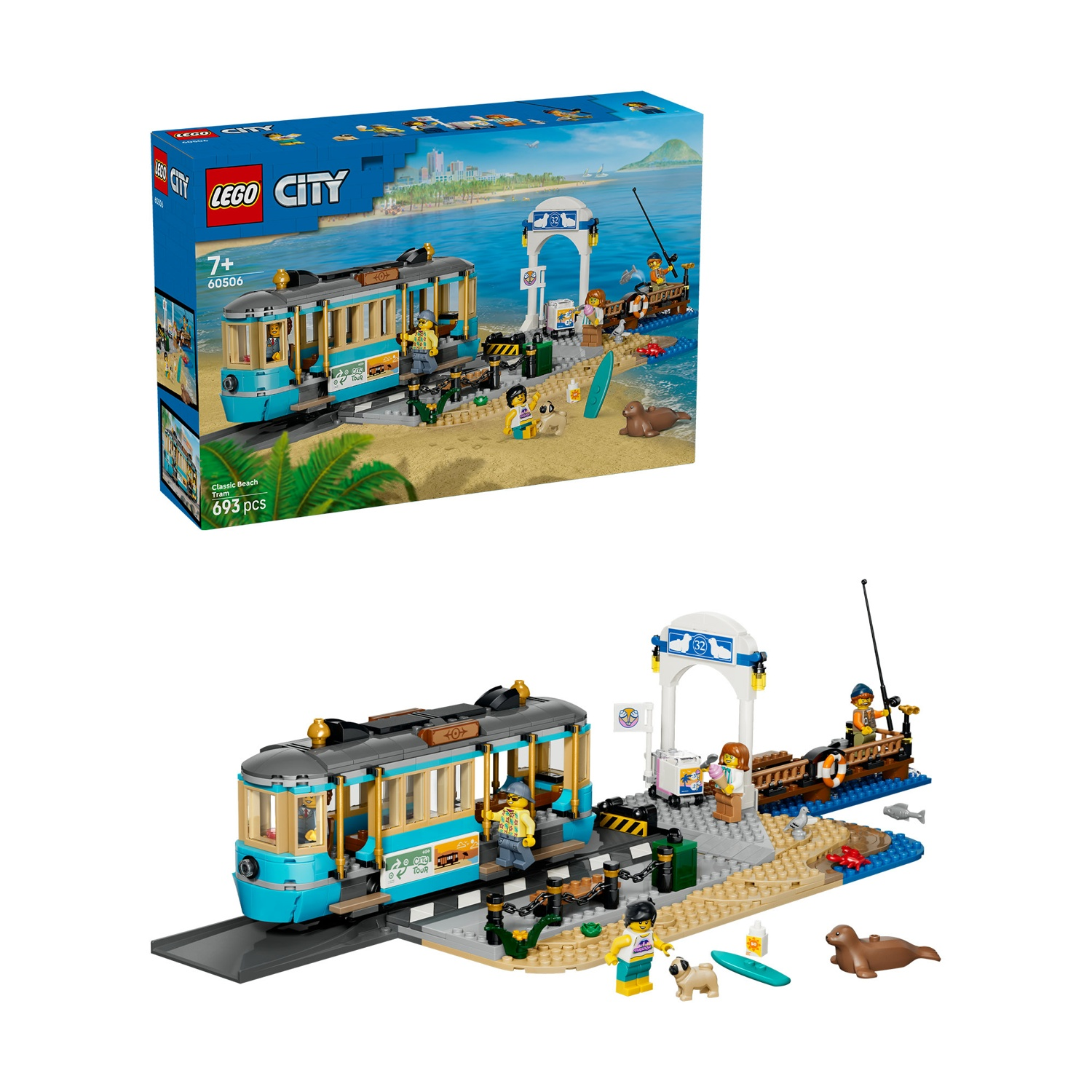 Un set LEGO con un tram blu su una spiaggia con figure, un cane e foche.