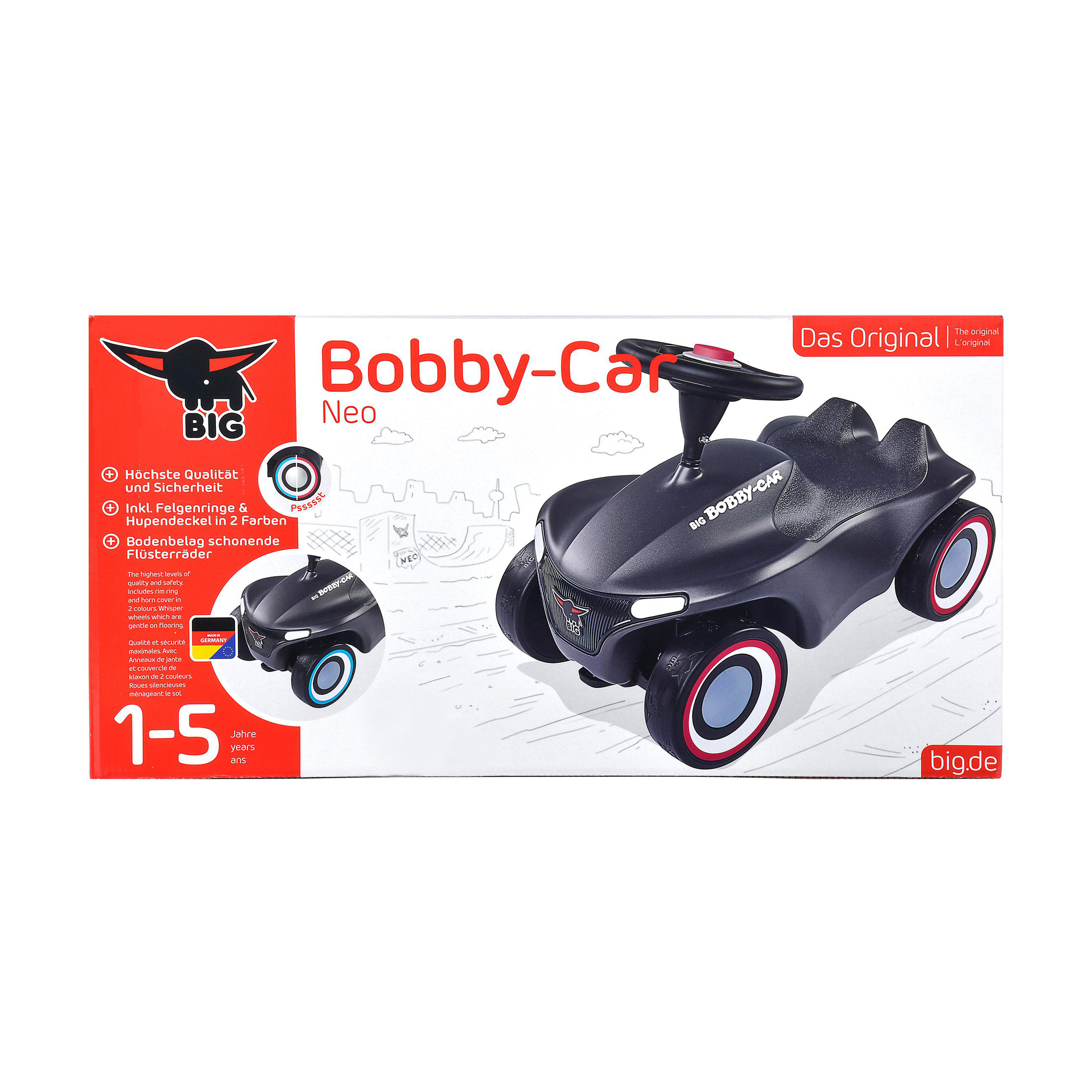 Ein schwarzes Bobby-Car mit roten Akzenten, Lenkrad und Scheibenwischern.