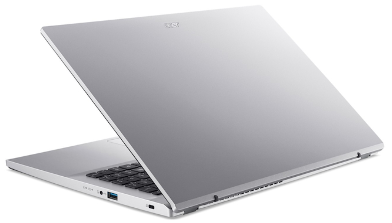 Un portátil plateado con la pantalla abierta, mostrando teclado y puertos.