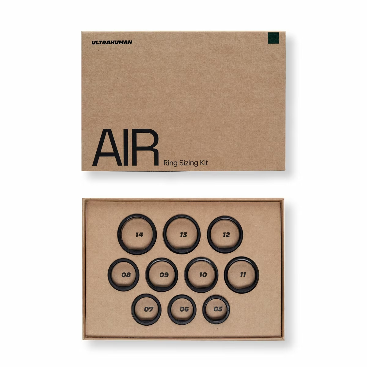 Caja de cartón con texto AIR Ring Sizing Kit. Caja abierta muestra anillos.