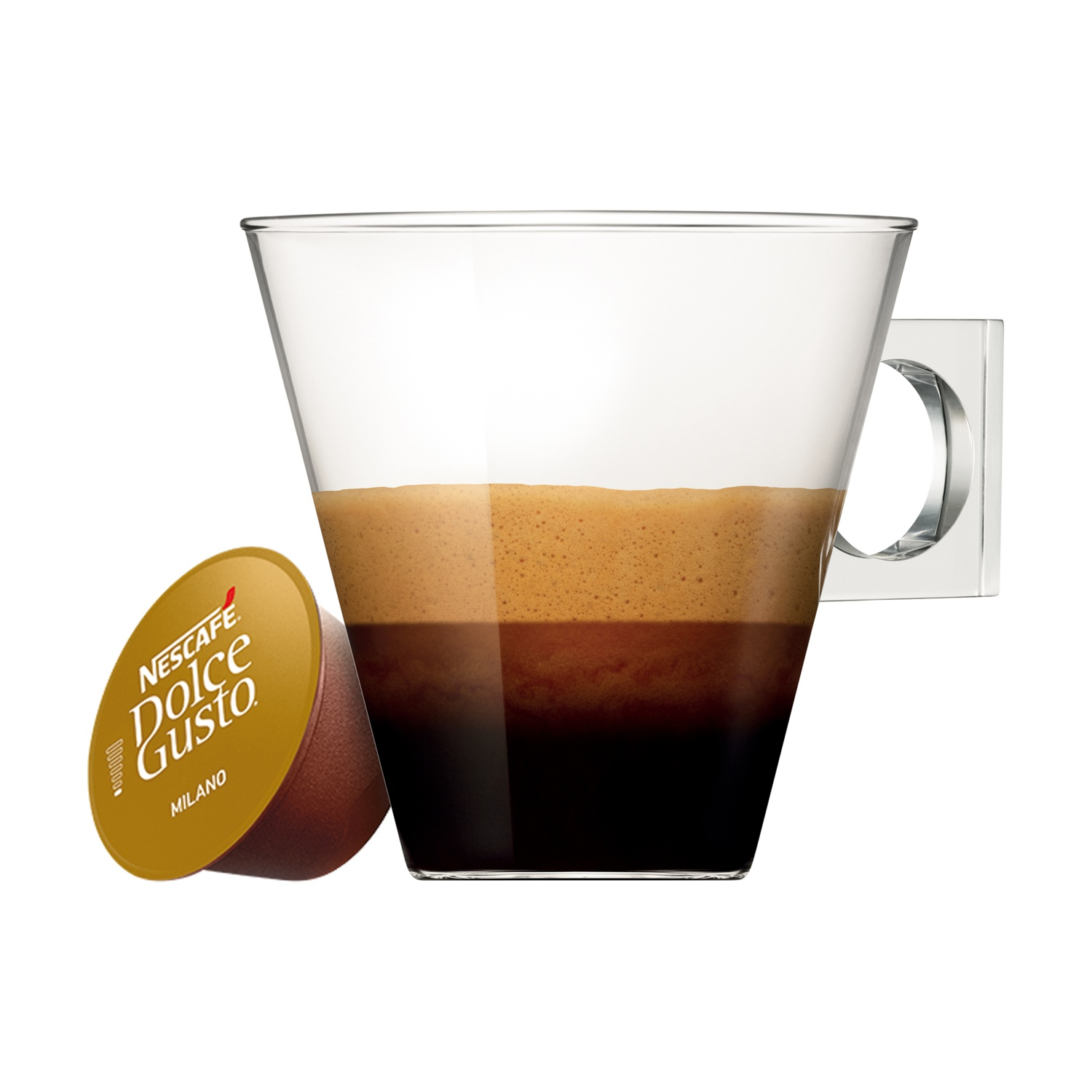 Una capsula di caffè dorata accanto a un bicchiere di espresso con schiuma cremosa.