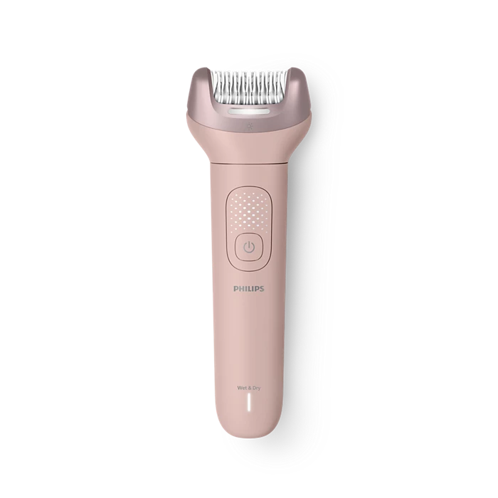 Una afeitadora Philips rosa con cabezal de afeitado y botón de encendido.