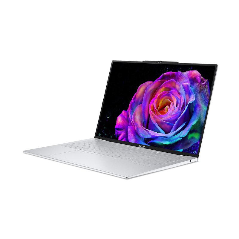 Silberner Laptop mit einem bunten Rosenbildschirm