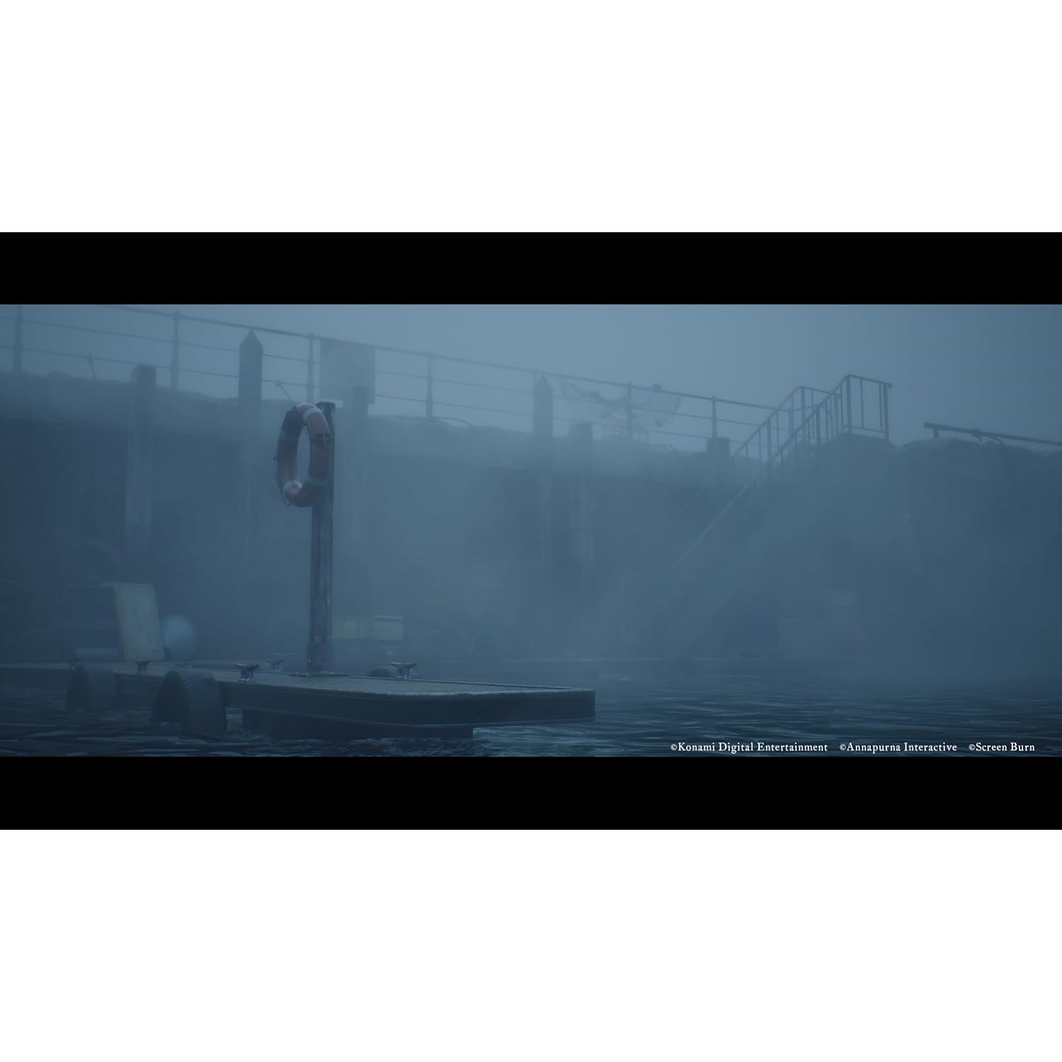 A life preserver hangs on a pole on a foggy dock next to a pier.