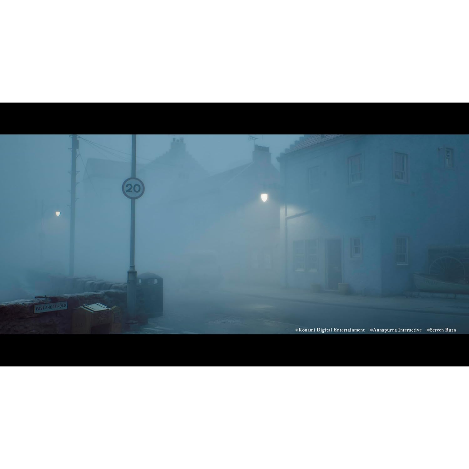 Misty street with blue houses, a speed limit sign, and a boat.