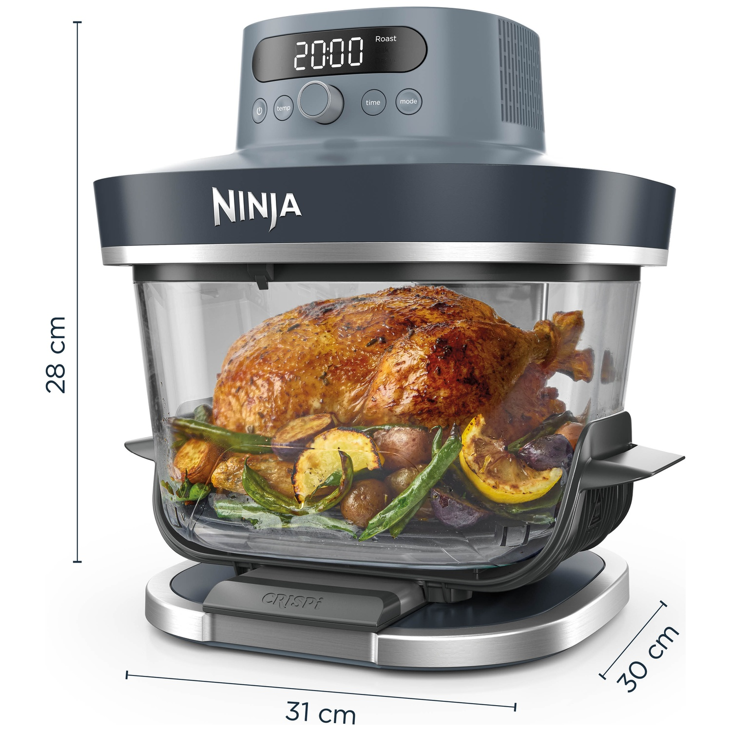 Friteuse à air Ninja avec poulet rôti et légumes à l'intérieur.
