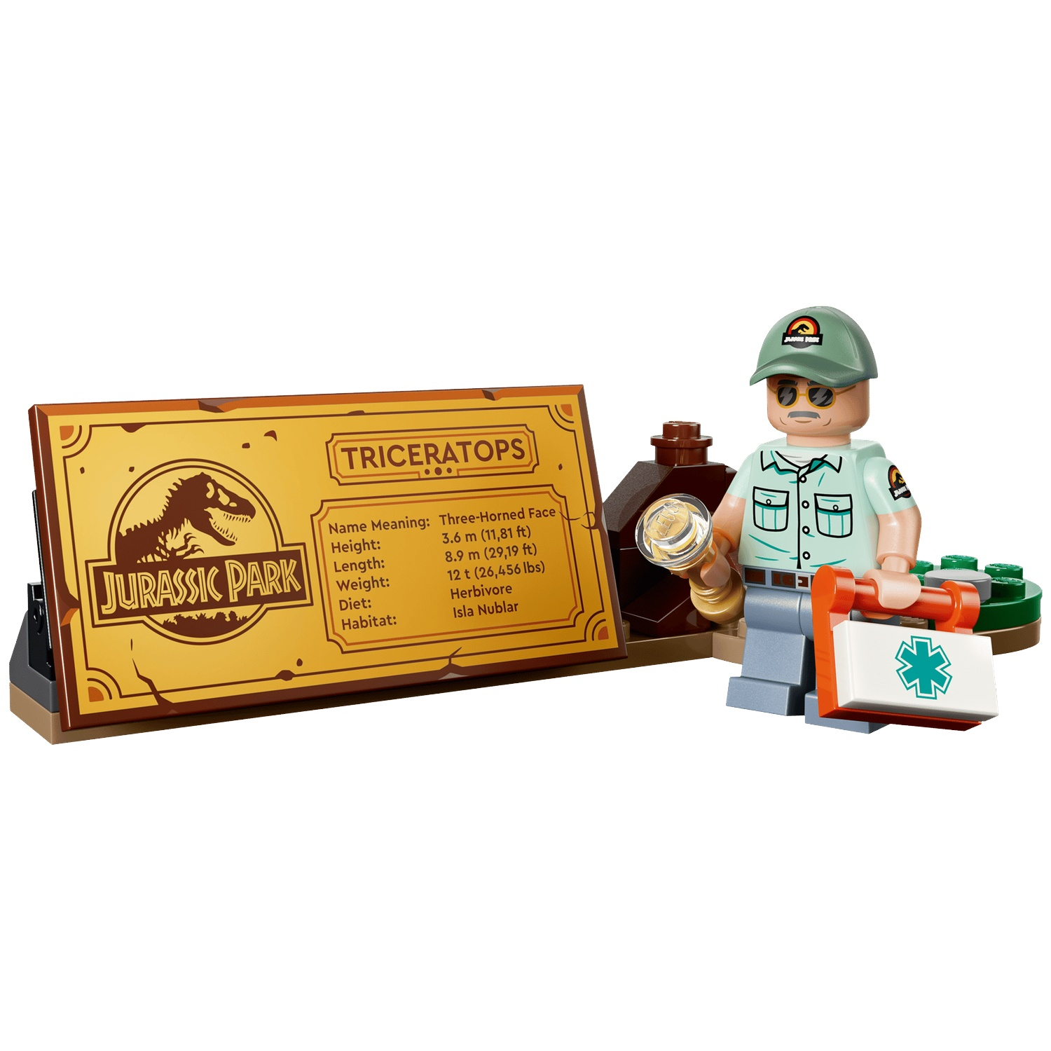 A Lego man with a Jurassic Park cap and first aid kit next to a sign.