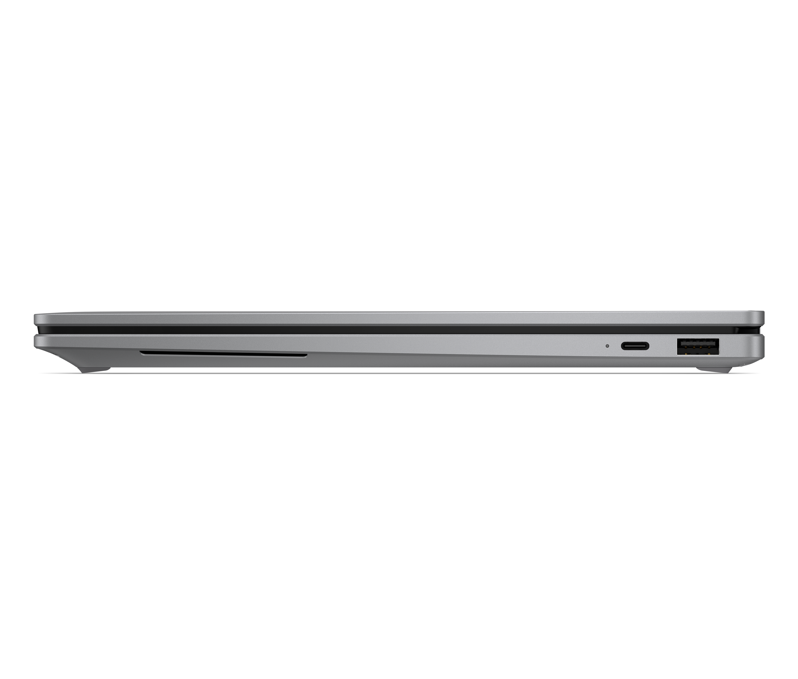 Die Seite eines schlanken, silbernen Laptops mit USB-C und USB-A Anschlüssen.