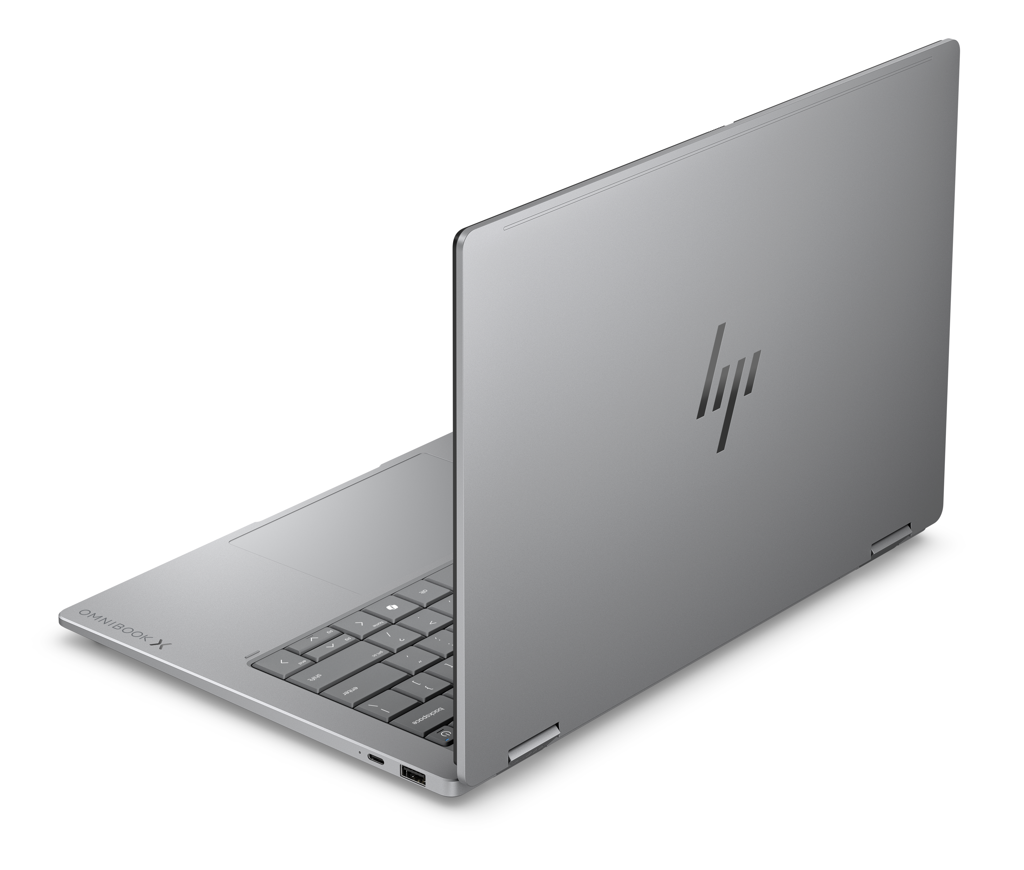 Ein silberner Laptop ist geöffnet und zeigt die Tastatur und das HP-Logo auf dem Deckel.