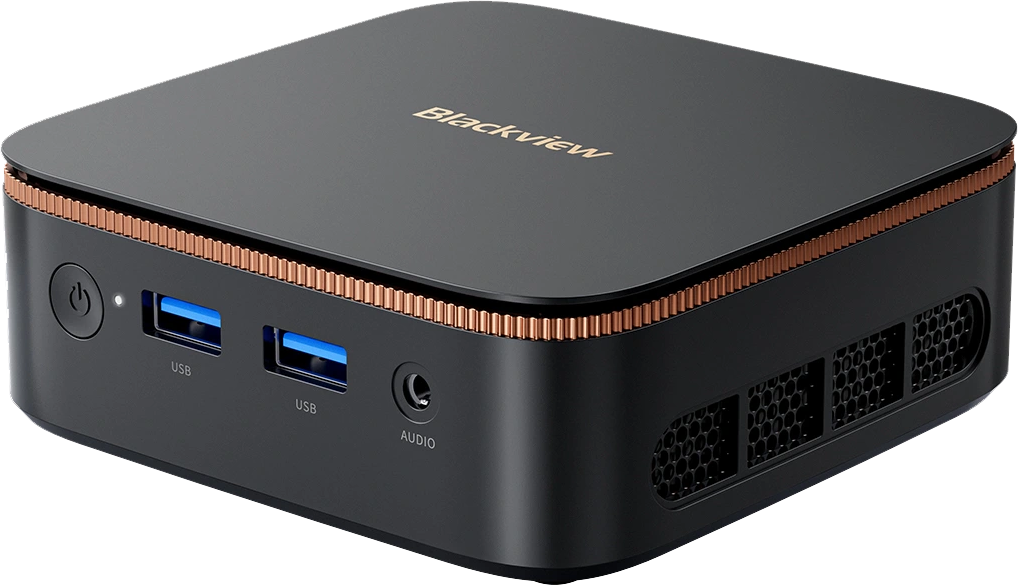 Egy kis fekete számítógép réz szegéllyel, két USB porttal és audio jackkel.