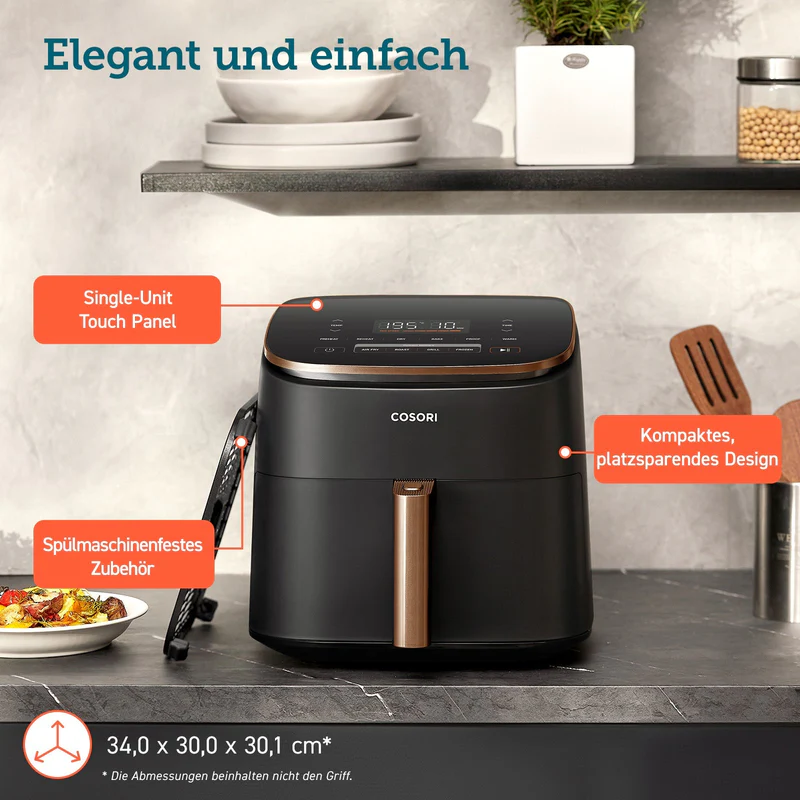 Friteuse à air noire avec écran tactile, à côté de nourriture et d'ustensiles.