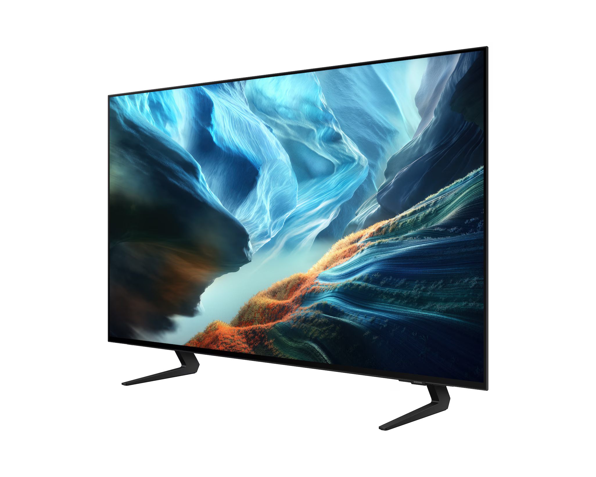 Egy fekete síkképernyős TV élénk kék és narancssárga kanyon tájat mutat.