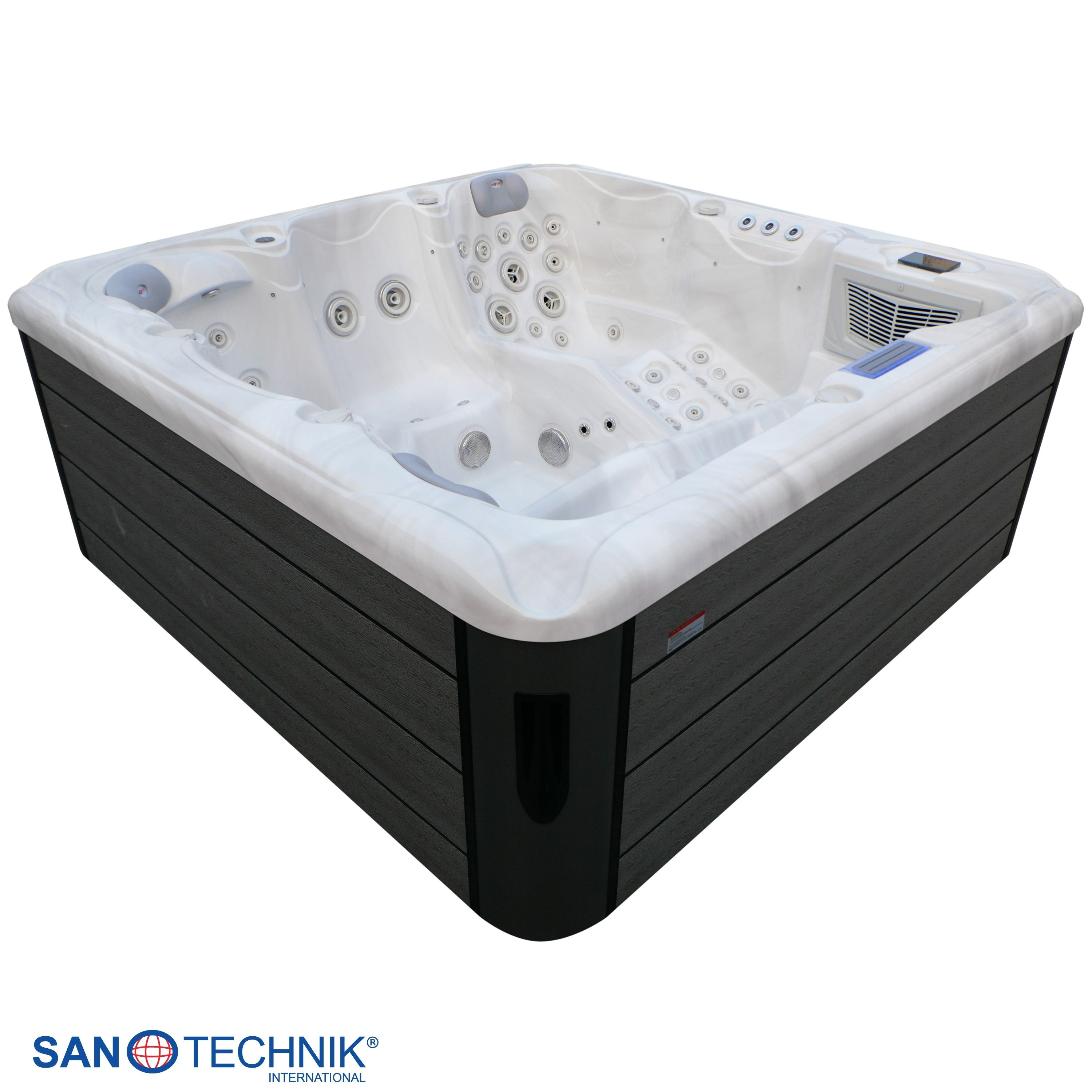 Ein weißer Whirlpool mit dunklem Holzverkleidung und mehreren Düsen.