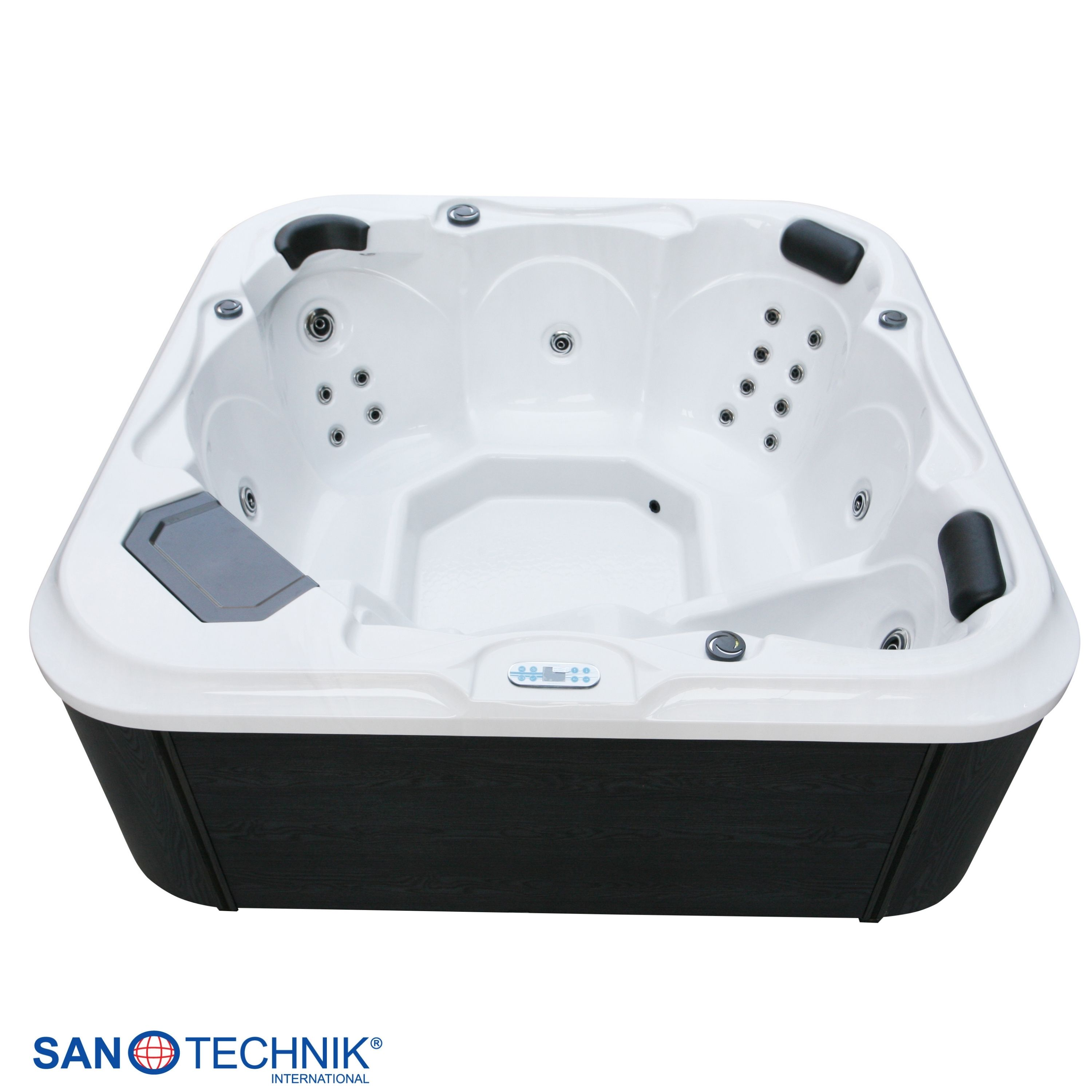 Ein weißer Whirlpool mit dunklem Sockel und schwarzen Kopfstützen.