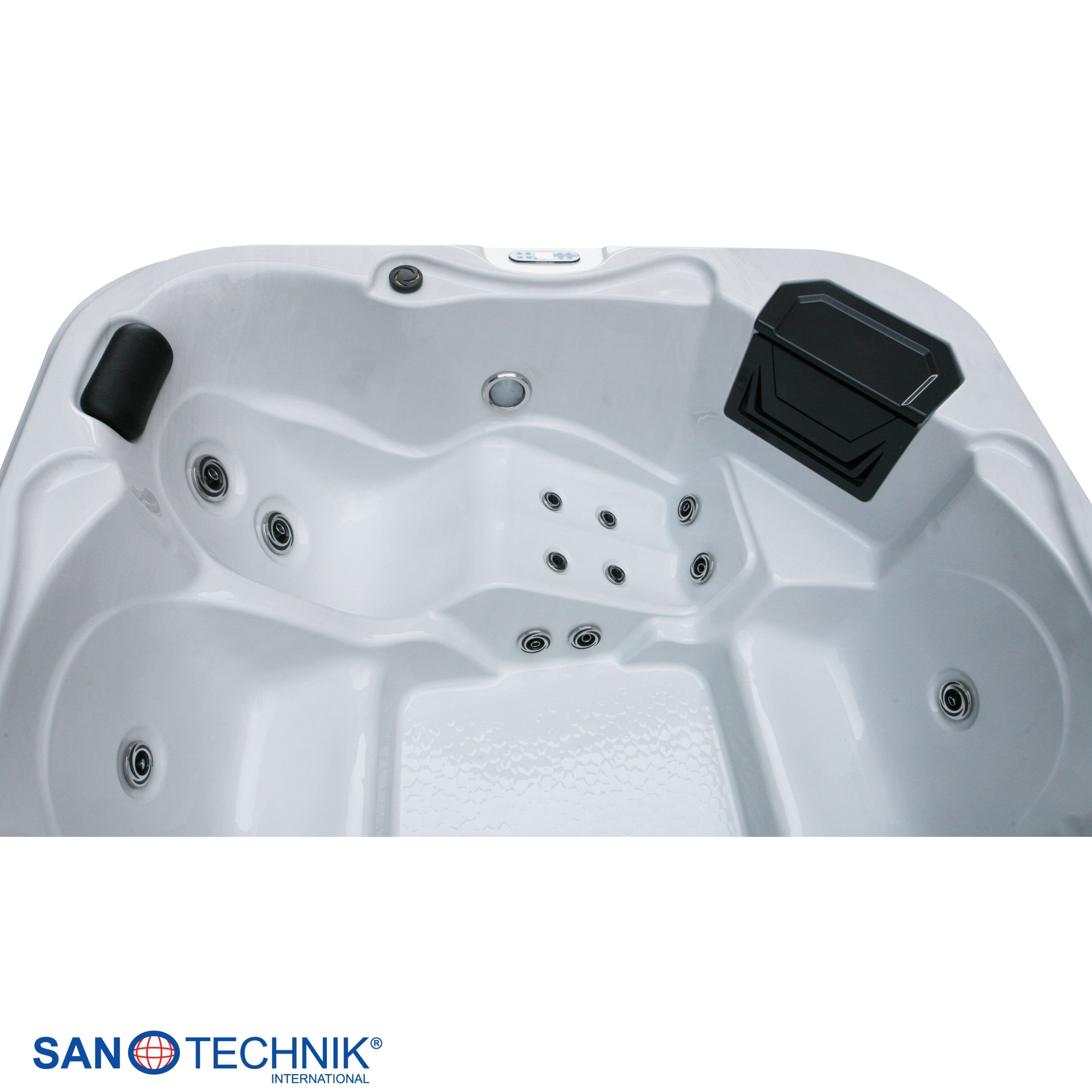 Ein weißer Whirlpool mit schwarzen Nackenrollen und Düsen.
