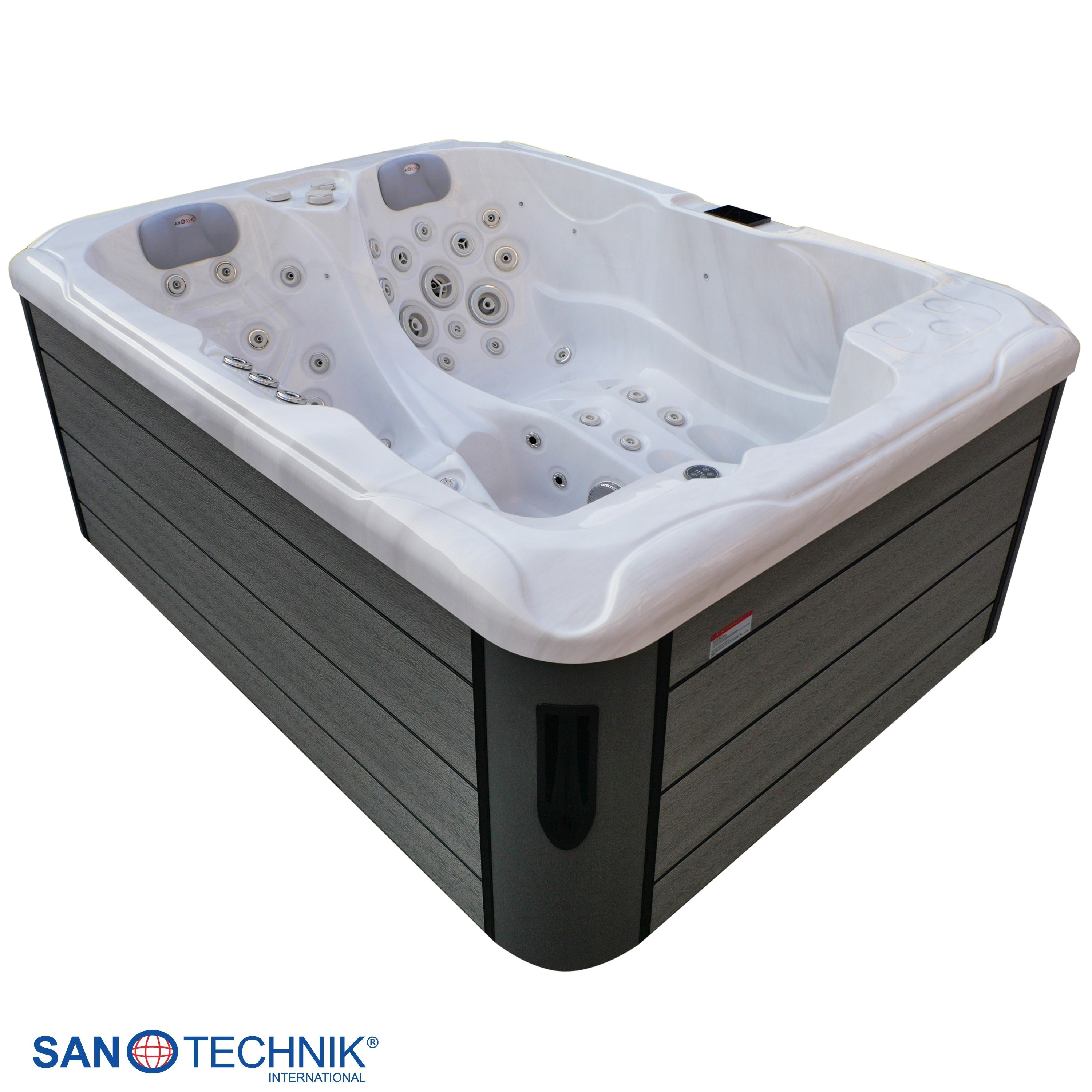 Ein weißer Whirlpool mit grauer Verkleidung und Düsen.