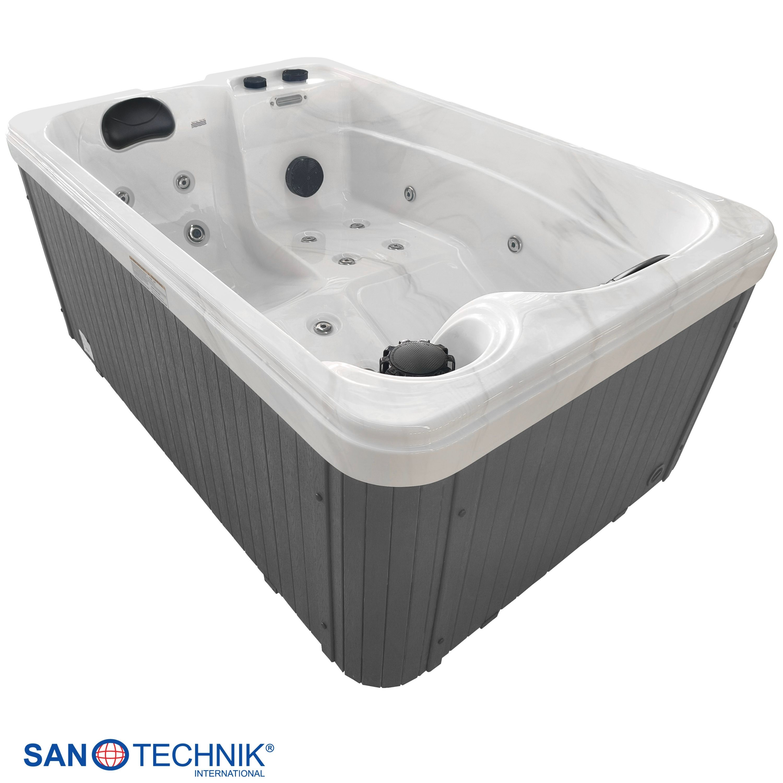 Ein rechteckiger Whirlpool mit grauer Verkleidung und weißer Innenseite.