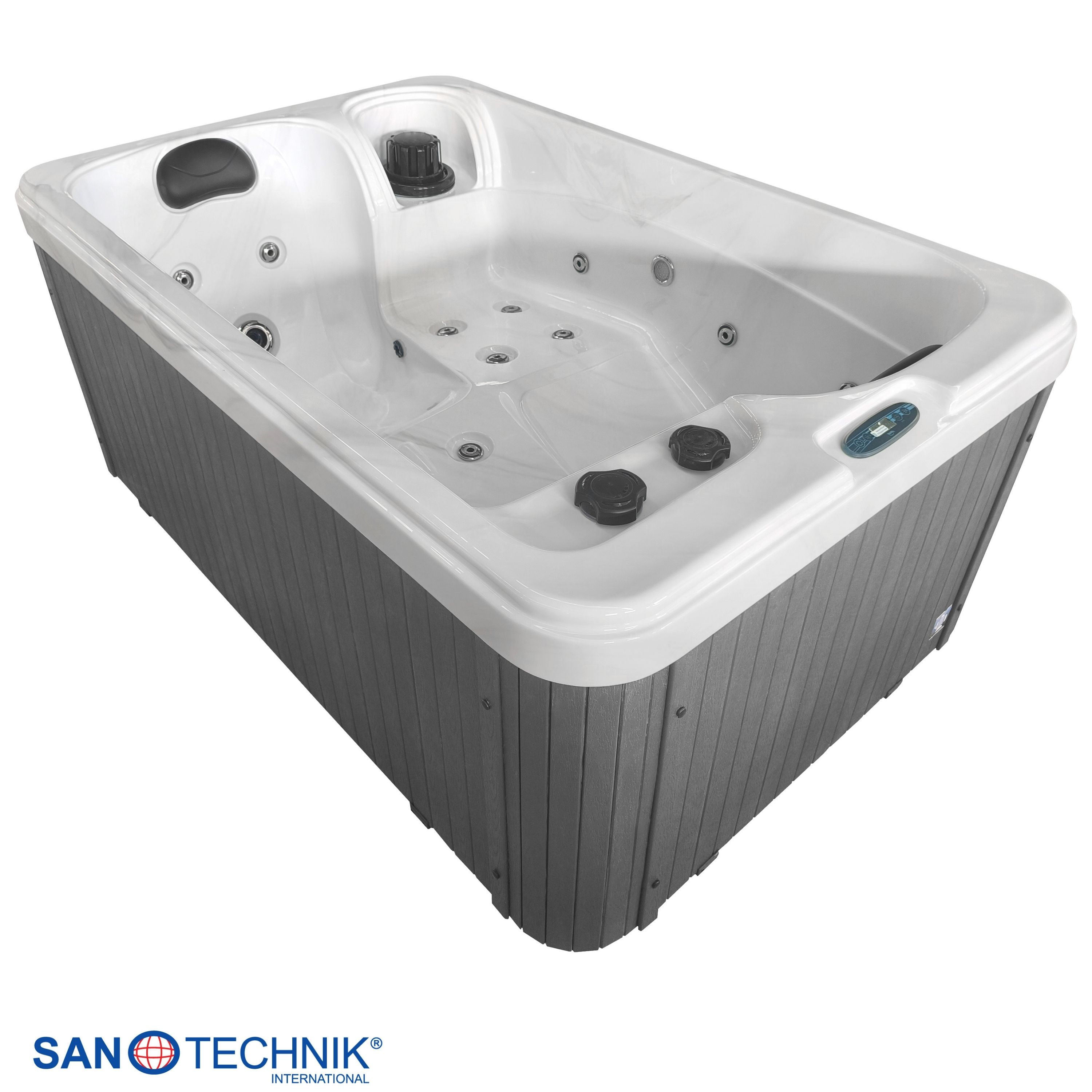 Ein rechteckiger Whirlpool mit weißer Wanne und grauer Verkleidung. Mit Kopfstütze und Düsen.