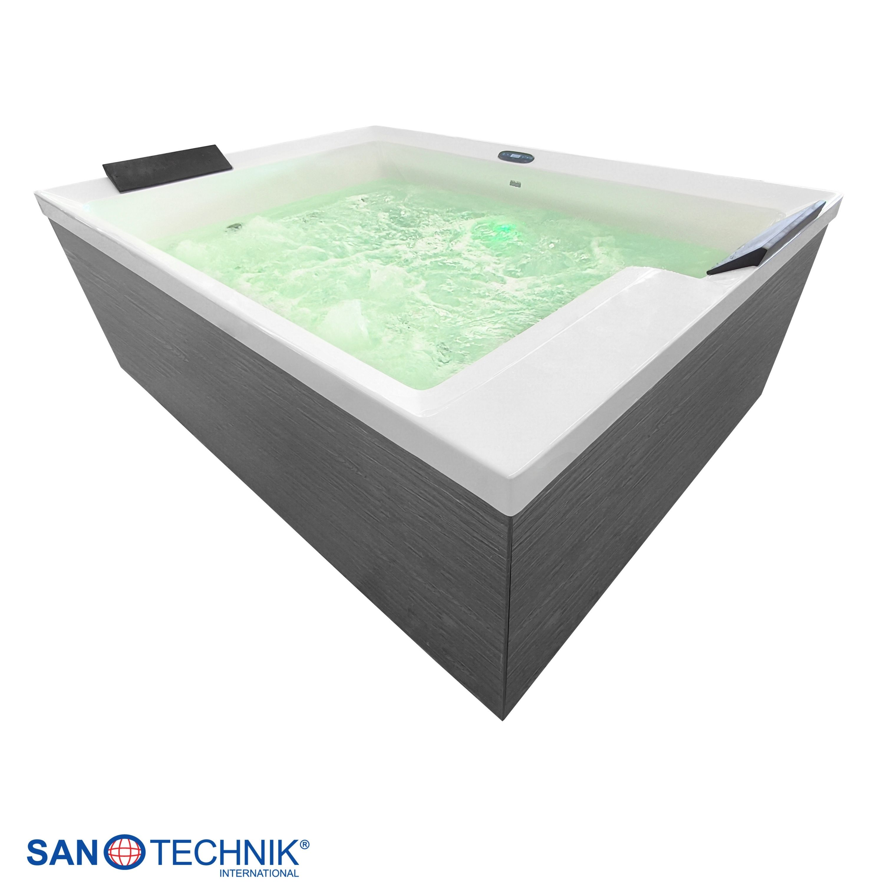 Ein moderner Whirlpool mit grauer Holzmaserung und beleuchtetem, sprudelndem Wasser.