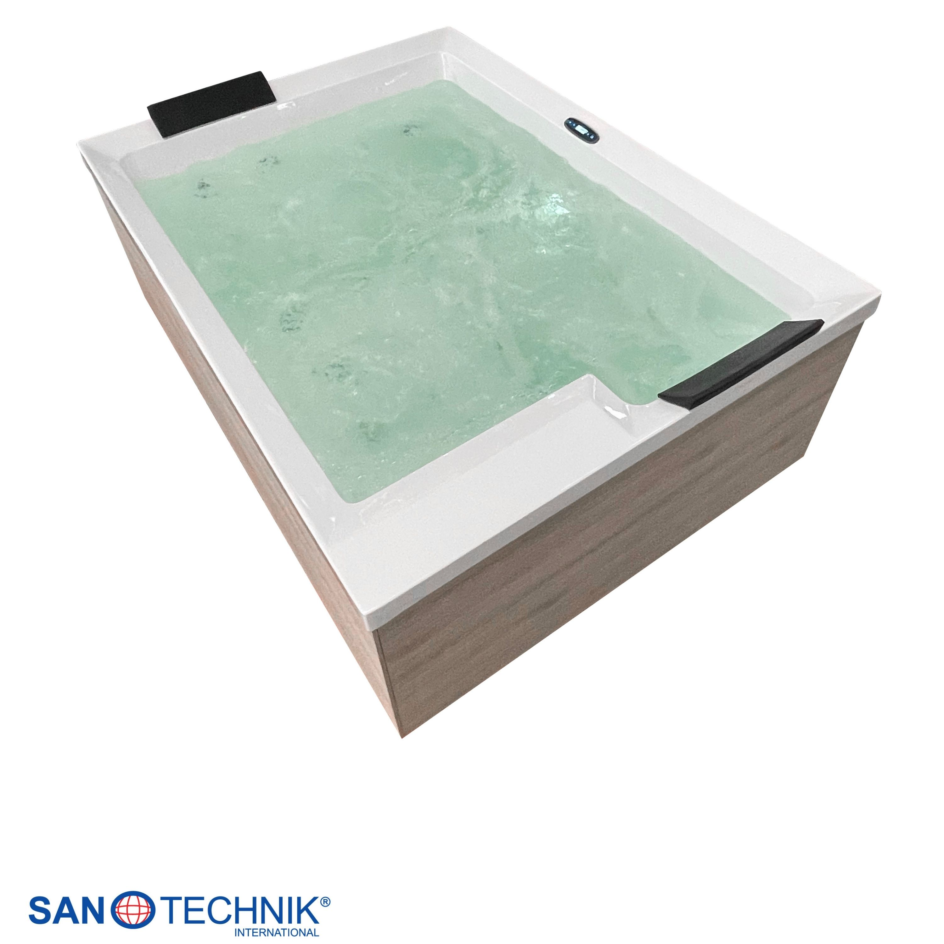Ein moderner Whirlpool mit Holzverkleidung und sprudelndem, grünem Wasser.